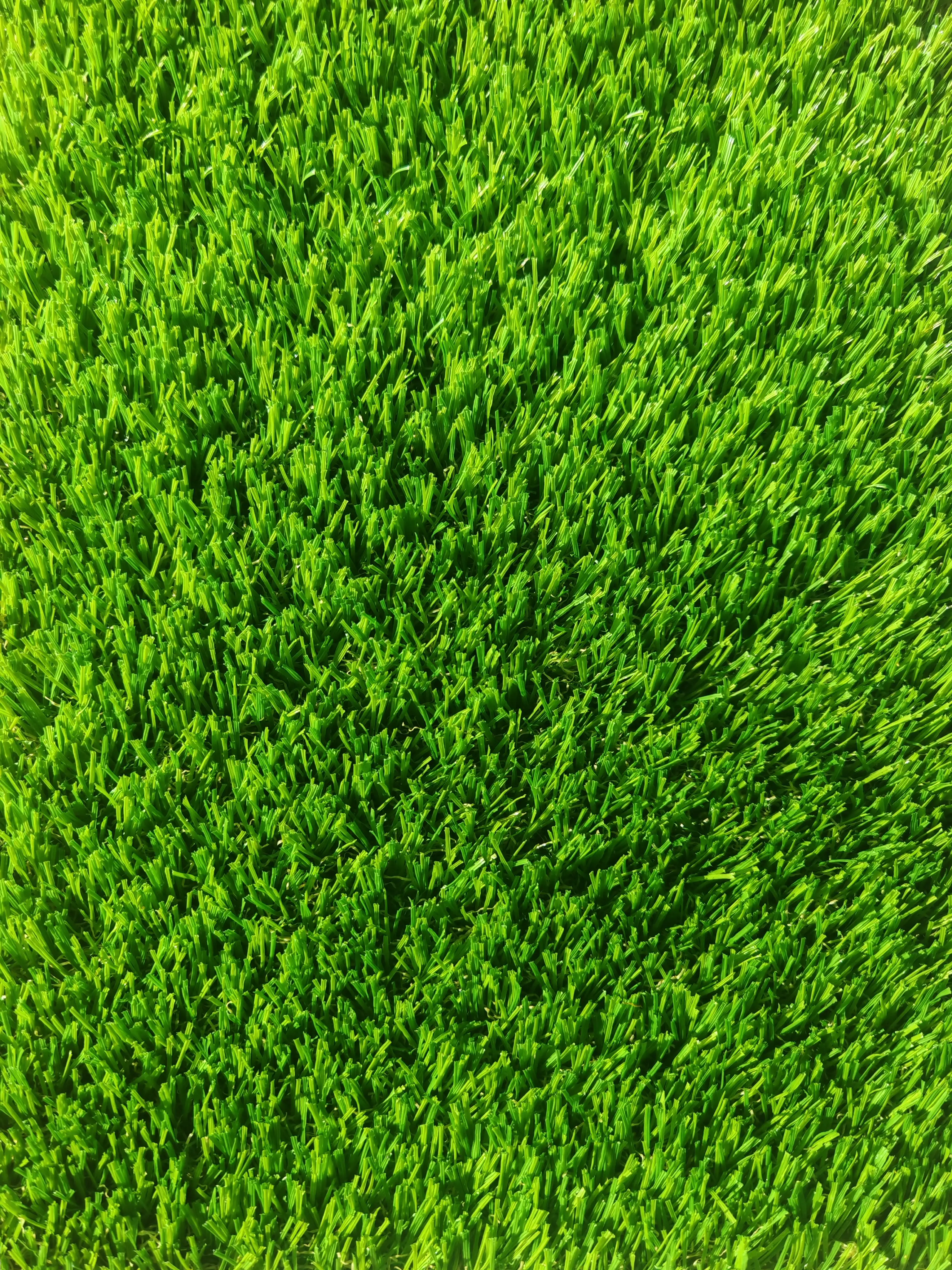 Premium 35mm green artificial grass shown close-up